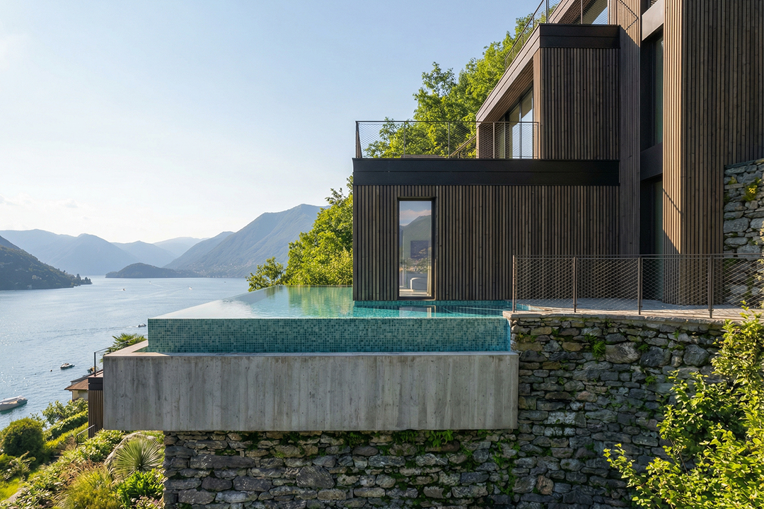 Prime Lake Como villa with a lake-facing infinity pool, illustrating the currency layer of a cross-border prime purchase